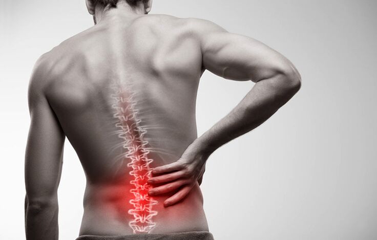 pain in the lower back due to osteochondrosis